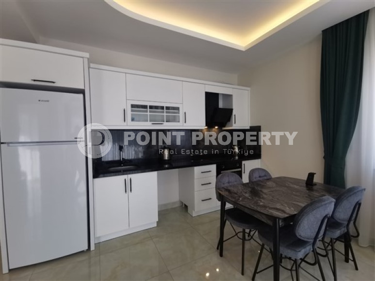 Недорогие апартаменты 1+1 с площадью 70 м2 в комплексе 2021 года постройки, район Махмутлар-id-3667-фото-15