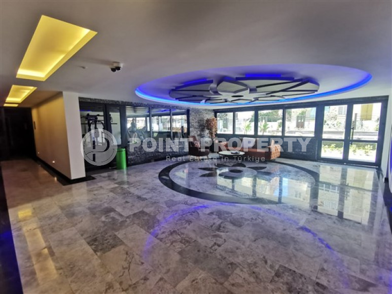 Недорогие апартаменты 1+1 с площадью 70 м2 в комплексе 2021 года постройки, район Махмутлар-id-3667-фото-17