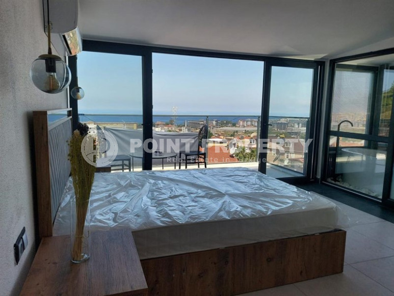 Стильная дизайнерская квартира с тремя спальнями, 140м², в таунхаусе в районе Алании Каргыджак-id-1319-фото-13