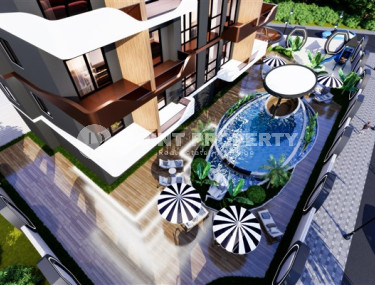 Апартаменты и дуплексы 55 - 100 м2 в строящемся бутик - проекте в районе Махмутлар, на удалении от моря-id-3677-фото-4