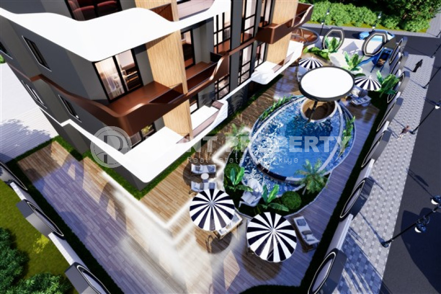 Апартаменты и дуплексы 55 - 100 м2 в строящемся бутик - проекте в районе Махмутлар, на удалении от моря-id-3677-фото-4