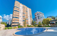 Nice three-room apartment with an area of 125 m2, two bathrooms and balconies in the Mahmutlar area-id-3678-photo-1