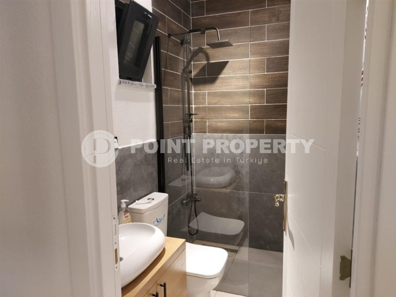 Стильная дизайнерская квартира с тремя спальнями, 140м², в таунхаусе в районе Алании Каргыджак-id-1319-фото-15