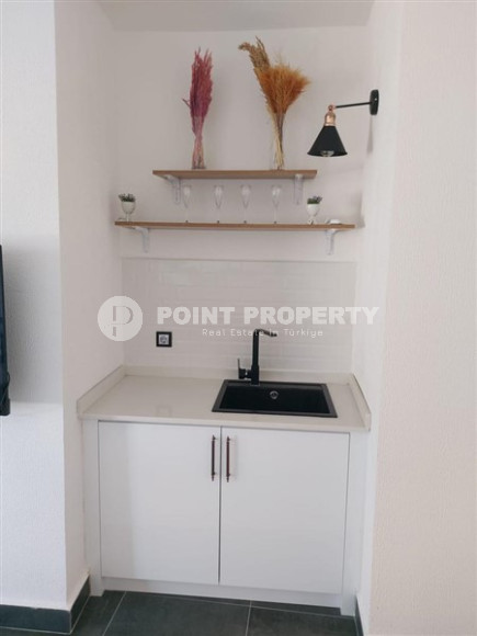 Стильная дизайнерская квартира с тремя спальнями, 140м², в таунхаусе в районе Алании Каргыджак-id-1319-фото-21