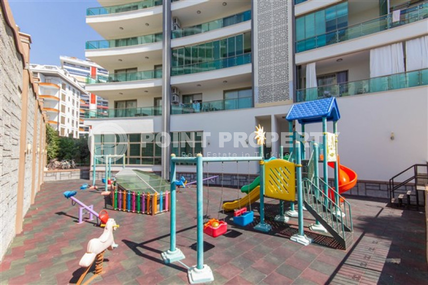Furnished two-room apartment 80 m2 in a high-rise residence, Mahmutlar district-id-3693-photo-4