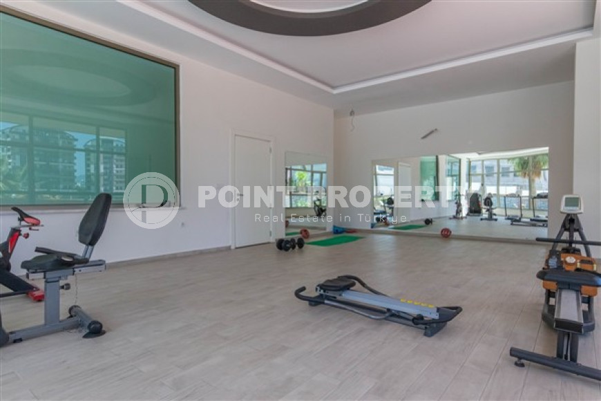Furnished two-room apartment 80 m2 in a high-rise residence, Mahmutlar district-id-3693-photo-5