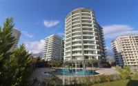 Furnished two-room apartment 80 m2 in a high-rise residence, Mahmutlar district-id-3693-photo-7
