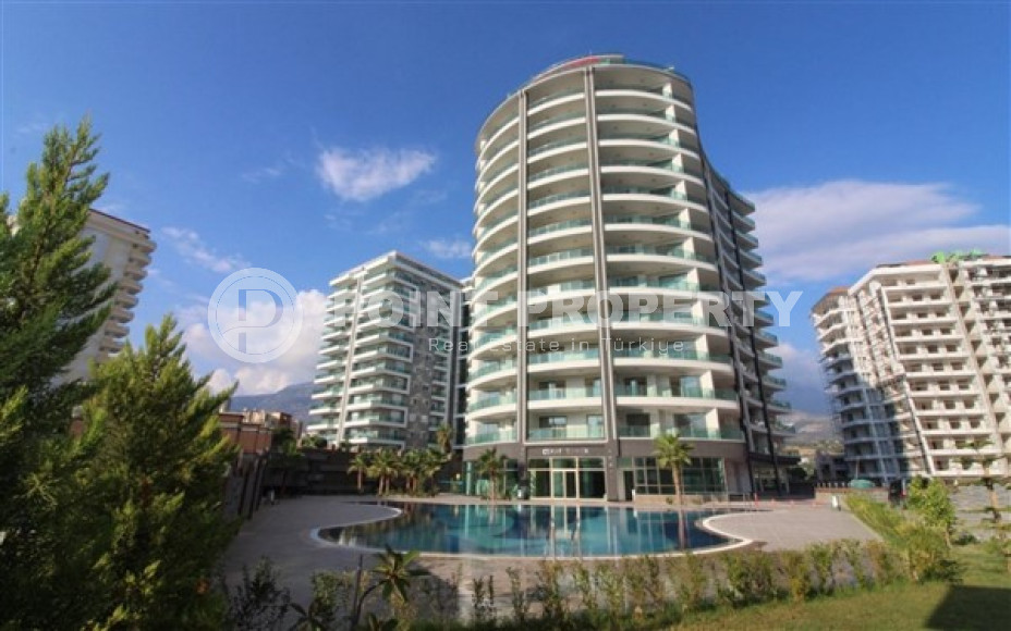 Furnished two-room apartment 80 m2 in a high-rise residence, Mahmutlar district-id-3693-photo-7