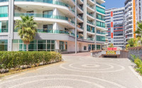 Furnished two-room apartment 80 m2 in a high-rise residence, Mahmutlar district-id-3693-photo-8