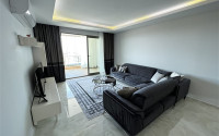 Furnished two-room apartment 80 m2 in a high-rise residence, Mahmutlar district-id-3693-photo-9