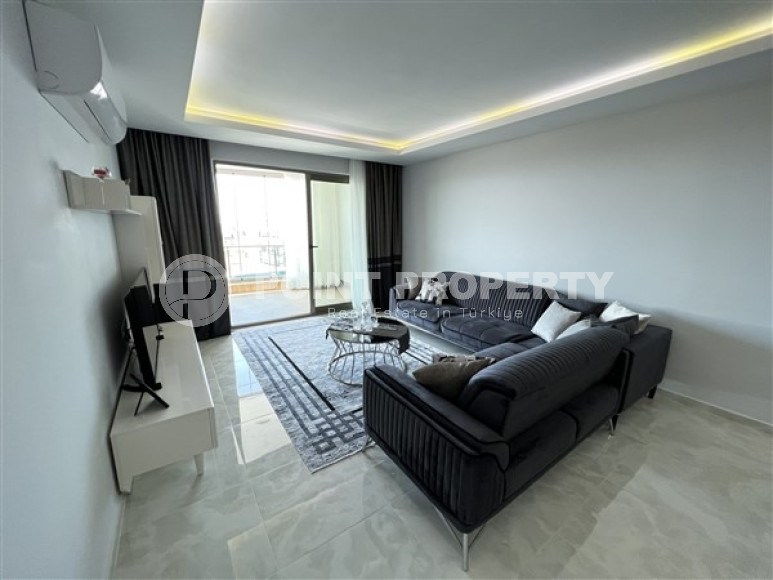 Furnished two-room apartment 80 m2 in a high-rise residence, Mahmutlar district-id-3693-photo-9