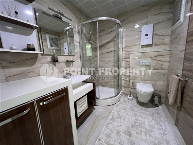 Меблированные двухкомнатные апартаменты 80 м2 в высотной резиденции, район Махмутлар-id-3693-фото-10