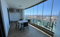Furnished two-room apartment 80 m2 in a high-rise residence, Mahmutlar district-id-3693-photo-12