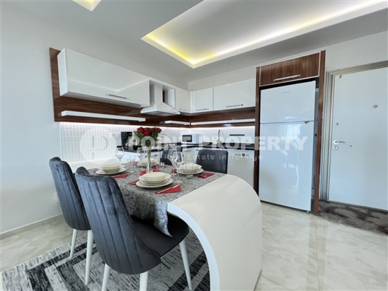 Меблированные двухкомнатные апартаменты 80 м2 в высотной резиденции, район Махмутлар-id-3693-фото-13