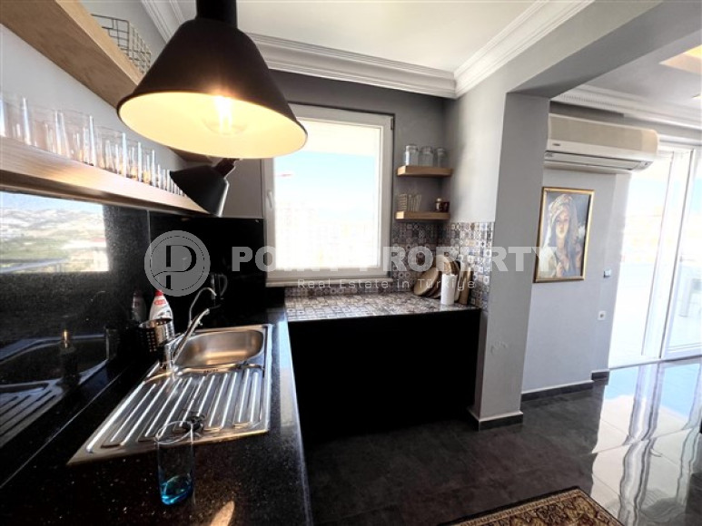 Дуплекс полностью меблированный, на 12-м этаже, с выходом на террасы, в районе Махмутлар.-id-3704-фото-2