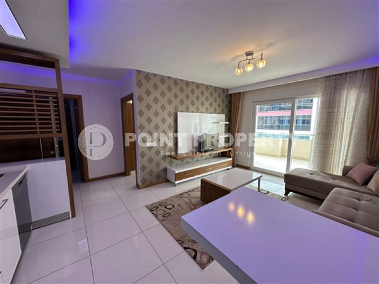 Двушка на высоком этаже в Махмутларе, полностью укомплектованная мебелью и техникой, 65 м2.-id-3707-фото-6