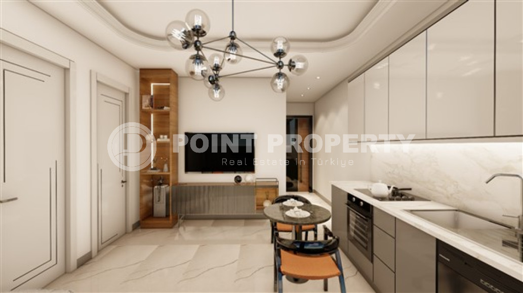 Компактная квартира 1+1 в центре Алании, в новом жилом комплексе, на окончательном этапе строительства.-id-3712-фото-5