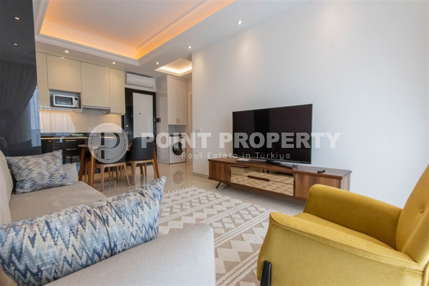 Квартира 1+1 в комплексе премиум класса в районе Махмутлар, всего в 10 минутах от моря, 65 м2-id-1321-фото-3