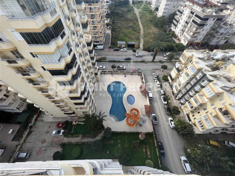 Дуплекс на 12-м этаже в центре района Махмутлар.-id-3718-фото-16