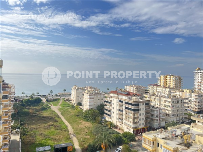 Дуплекс на 12-м этаже в центре района Махмутлар.-id-3718-фото-17