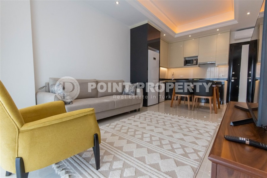 Квартира 1+1 в комплексе премиум класса в районе Махмутлар, всего в 10 минутах от моря, 65 м2-id-1321-фото-4