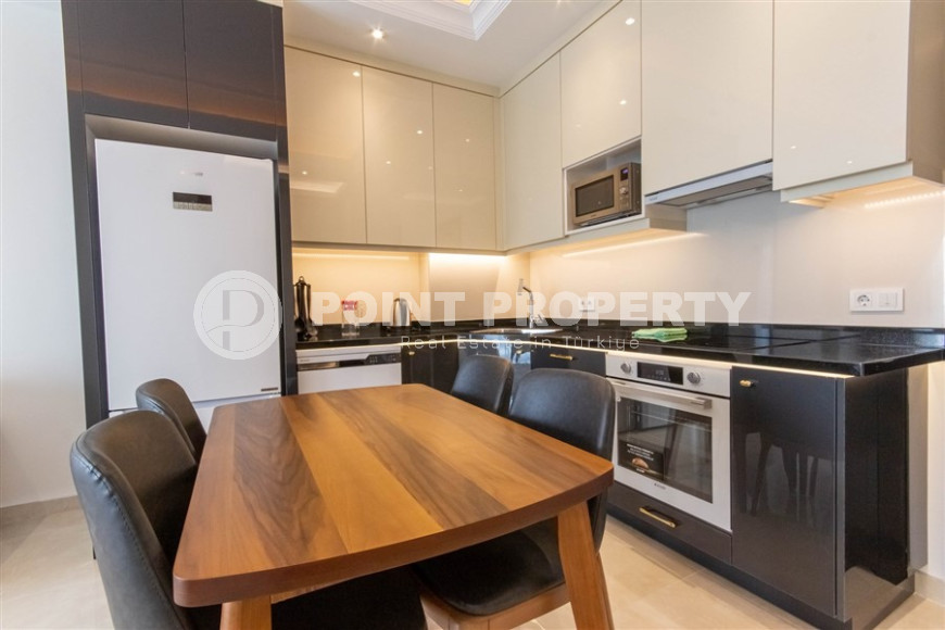 Квартира 1+1 в комплексе премиум класса в районе Махмутлар, всего в 10 минутах от моря, 65 м2-id-1321-фото-7