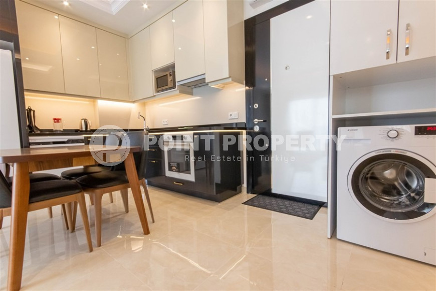 Квартира 1+1 в комплексе премиум класса в районе Махмутлар, всего в 10 минутах от моря, 65 м2-id-1321-фото-8