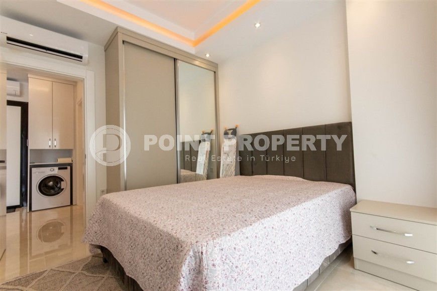 Квартира 1+1 в комплексе премиум класса в районе Махмутлар, всего в 10 минутах от моря, 65 м2-id-1321-фото-9