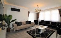 Stylish 2+1 apartment in the center of Mahmutlar and 200 meters from the beach.-id-3736-photo-1