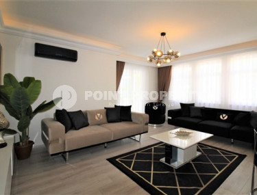 Stylish 2+1 apartment in the center of Mahmutlar and 200 meters from the beach.-id-3736-photo-1