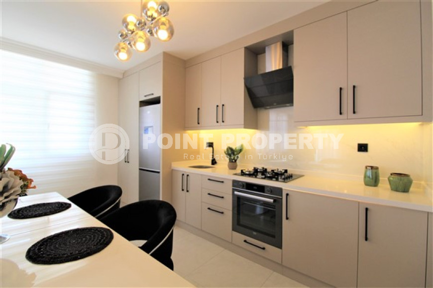 Stylish 2+1 apartment in the center of Mahmutlar and 200 meters from the beach.-id-3736-photo-2