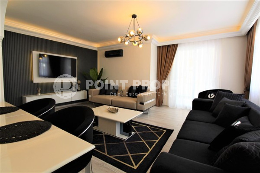 Stylish 2+1 apartment in the center of Mahmutlar and 200 meters from the beach.-id-3736-photo-3