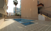 Stylish 2+1 apartment in the center of Mahmutlar and 200 meters from the beach.-id-3736-photo-11