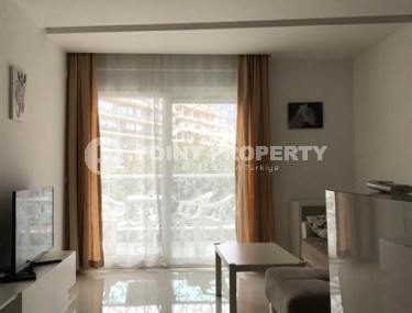 Апартаменты с одной спальной комнатой в центре Аланьи и в 350 метрах от пляжа Клеопатры.-id-3740-фото-3