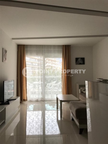 Апартаменты с одной спальной комнатой в центре Аланьи и в 350 метрах от пляжа Клеопатры.-id-3740-фото-3