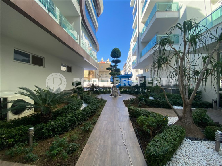 Апартаменты с одной спальной комнатой в центре Аланьи и в 350 метрах от пляжа Клеопатры.-id-3740-фото-14