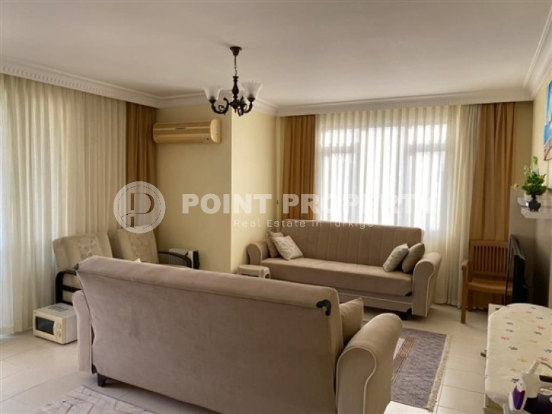 Просторная квартира 2+1 на 9-м этаже в центре района Махмутлар.-id-3741-фото-2