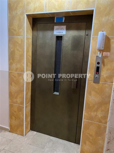 Просторная квартира 2+1 на 9-м этаже в центре района Махмутлар.-id-3741-фото-11