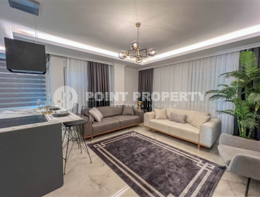 Spacious 3+1 duplex on the 5th floor with an attic in the center of Mahmutlar.-id-3747-photo-1