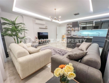 Просторный дуплекс 3+1 на 5-м этаже с мансардой в центре района Махмутлар.-id-3747-фото-2