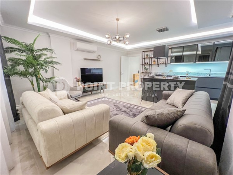 Spacious 3+1 duplex on the 5th floor with an attic in the center of Mahmutlar.-id-3747-photo-2