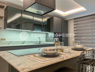 Просторный дуплекс 3+1 на 5-м этаже с мансардой в центре района Махмутлар.-id-3747-фото-3