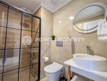 Просторный дуплекс 3+1 на 5-м этаже с мансардой в центре района Махмутлар.-id-3747-фото-5