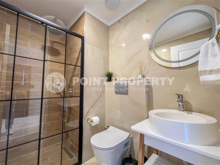 Spacious 3+1 duplex on the 5th floor with an attic in the center of Mahmutlar.-id-3747-photo-5