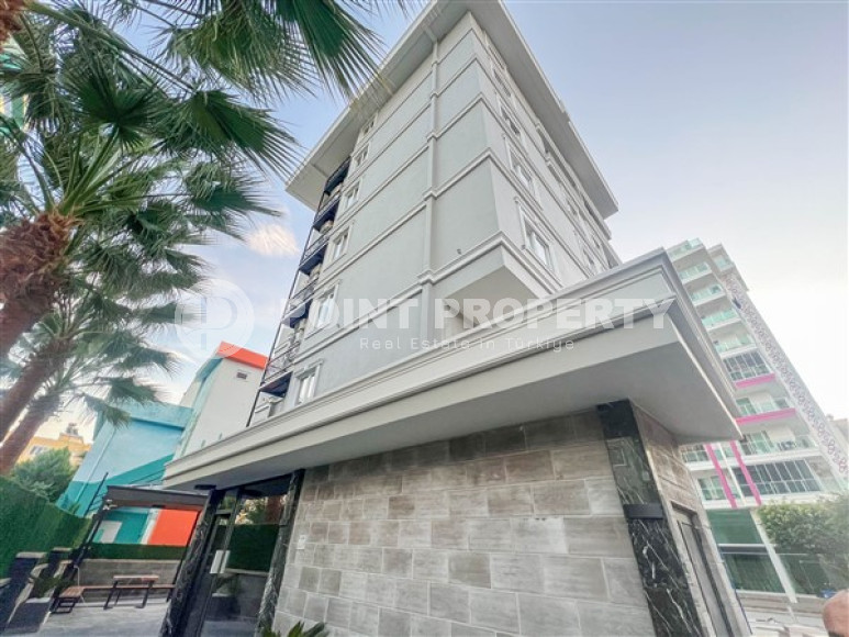 Spacious 3+1 duplex on the 5th floor with an attic in the center of Mahmutlar.-id-3747-photo-17