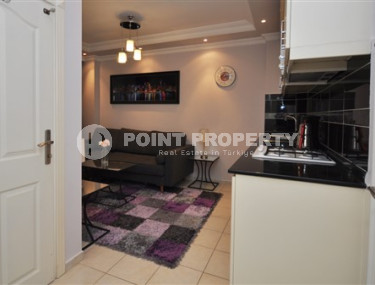 Небольшие апартаменты 1+1 с площадью 45 м2 недалеко от пляжа Клеопатры, центр Аланьи-id-3756-фото-2