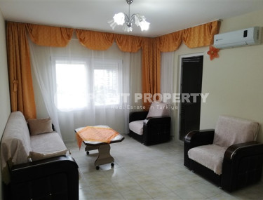 Comfortable apartment of 95 m2 with furniture 100 meters from the sea, Tosmur district-id-3774-photo-1