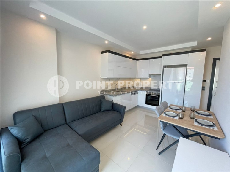 Excellent apartment in a new building 1+1, 50m2 in the prestigious area of Alanya Mahmutlar. 650m to the sea-id-1322-photo-3