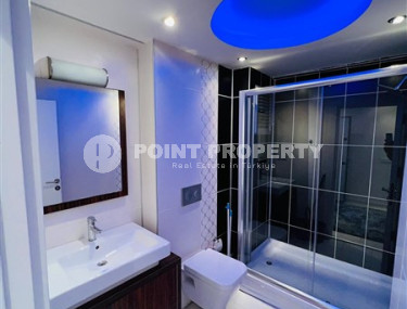 Стильная однокомнатная квартира в центре района Махмутлар и в 700 метрах от моря.-id-3778-фото-3