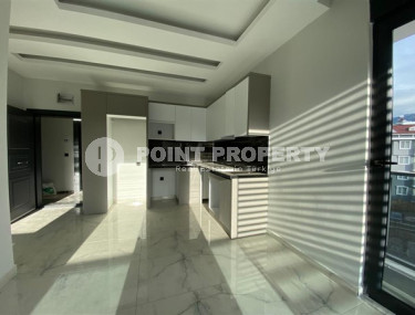 Новая однокомнатная квартира, общей площадью 55 м2, в престижном районе Оба.-id-3779-фото-2